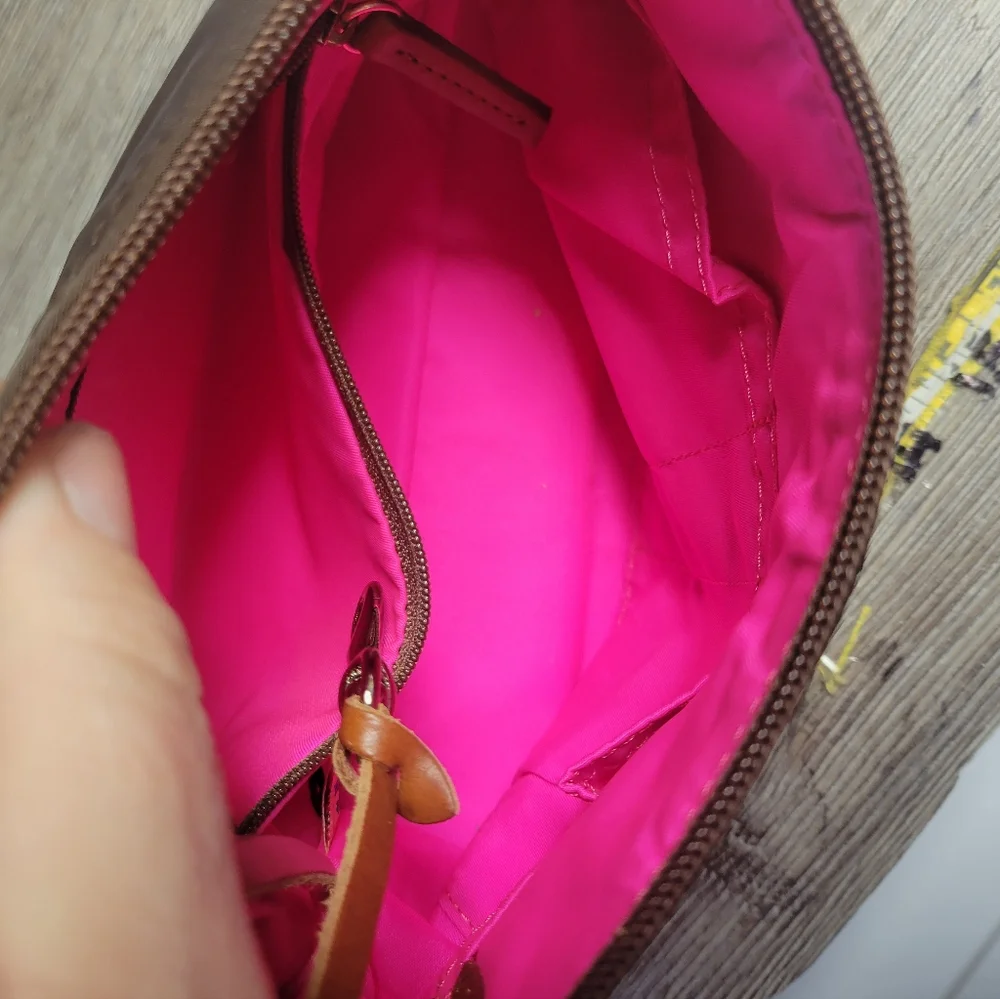 Dooney and Bourke Brown nylon Hand bag‎